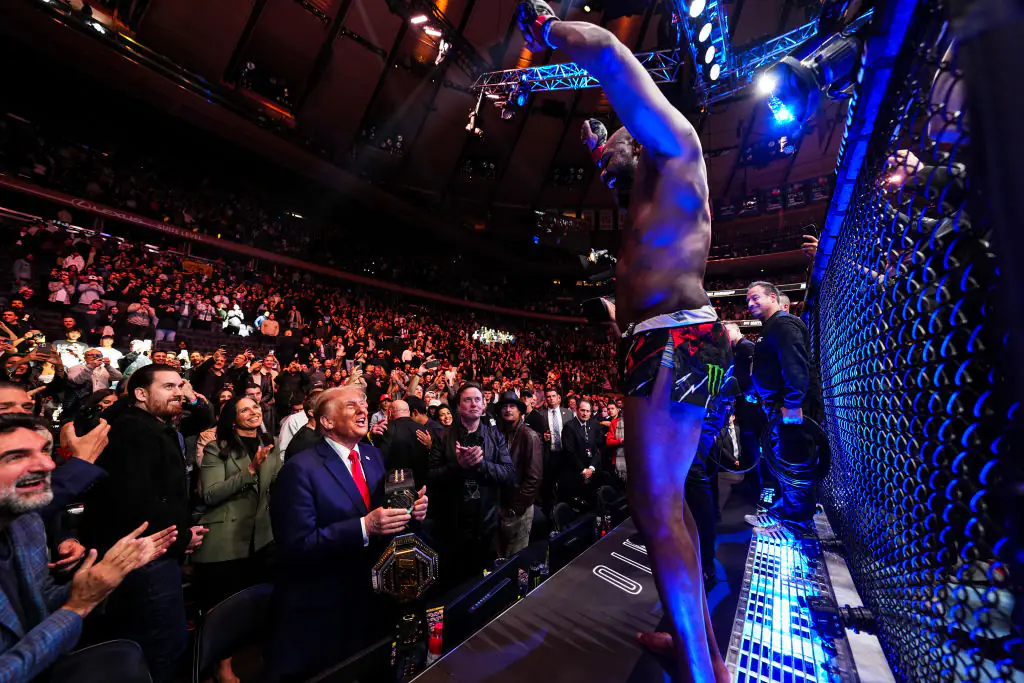 Trump celebrating with UFC fighter Jon Jones. Credit: Chris Unger / Getty