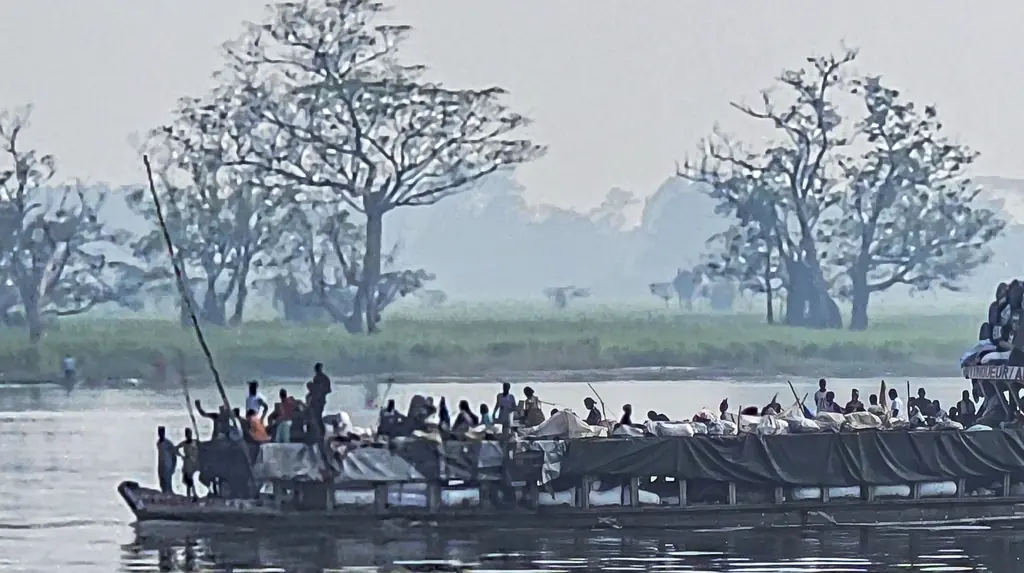 At least 50 dead and hundreds missing as devastating fire causes boat to capsize