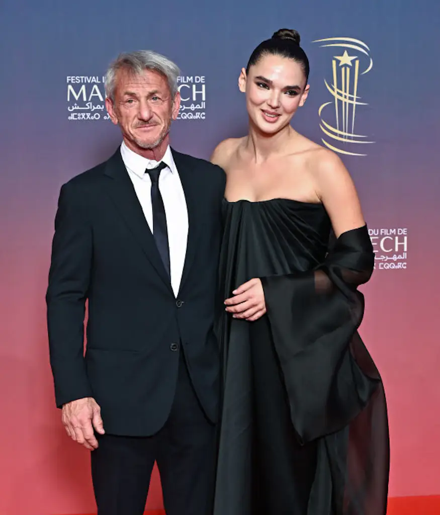 Penn was all smiles as the couple walked the red carpet. Credit: Stephane Cardinale - Corbis / Getty