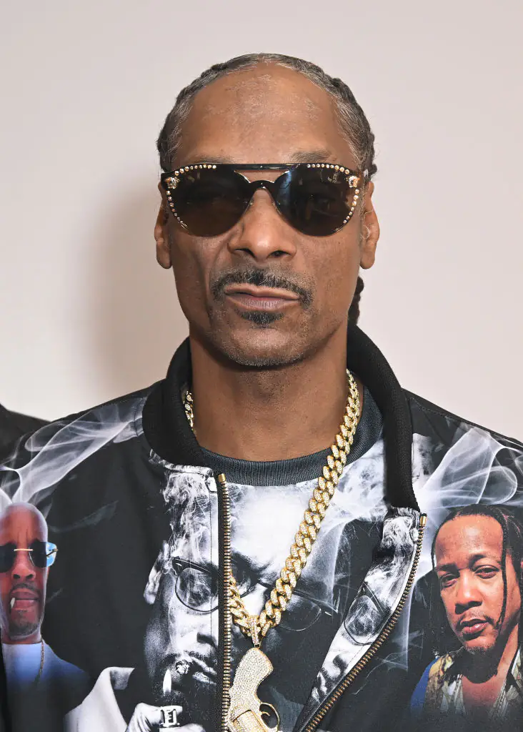 Snoop Dogg's asked Kim Kardashian if he is allowed to smoke at Kris Jenner's party. Credit: Michael Tullberg/Getty