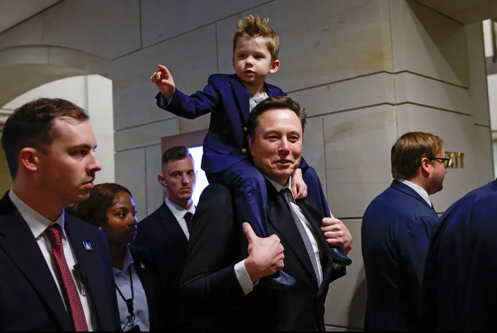 Elon Musk with his son X. Credit:	Anna Moneymaker / Getty
