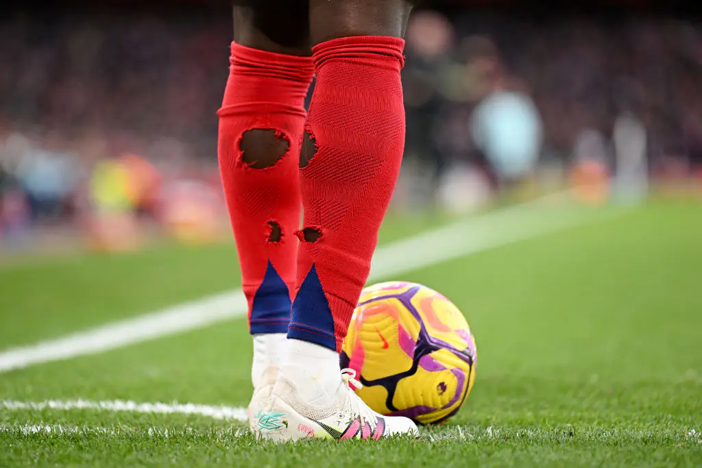 Many players have been spotted cutting holes in their socks. Credit:	Stuart MacFarlane / Getty
