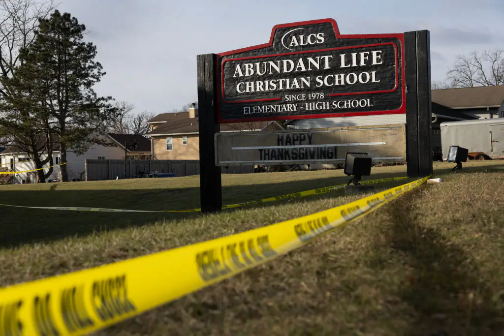 Crime scene tape continues to be stretched around Abundant Life Christian School as police continue to investigate Monday's shooting. Credit: Scott Olson/Getty