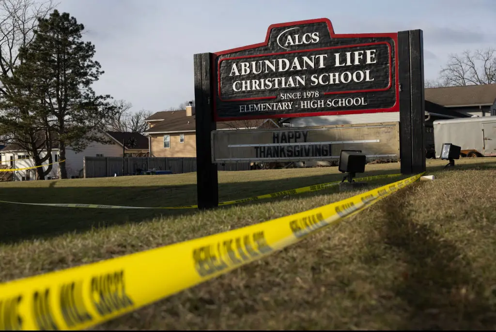 Crime scene tape continues to be stretched around Abundant Life Christian School as police continue to investigate Monday's shooting. Credit: Scott Olson/Getty