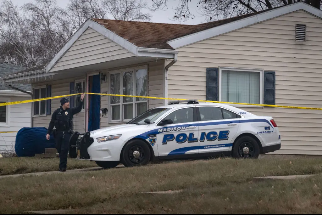 Police stand guard outside the home of 15-year-old Natalie “Samantha” Rupnow after she killed two people at school in Wisconsin. Credit: Scott Olson/Getty