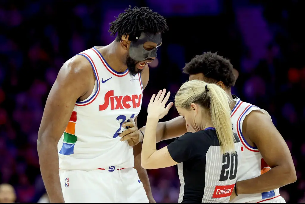 Embiid had to be restrained. Credit: Emilee Chinn/Getty