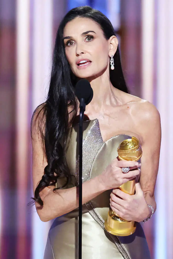 While winners like Demi Moore received trophies, nominees were given extravagant overseas hotel stays, facelift vouchers, and expensive cigars. Credit: Rich Polk/GG2025 / Getty