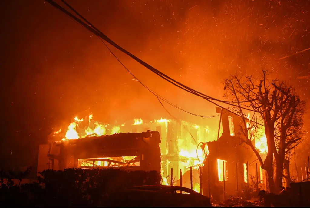  fast-moving wildfire has forced 100,000 people to evacuate,  Credit: Anadolu / Getty