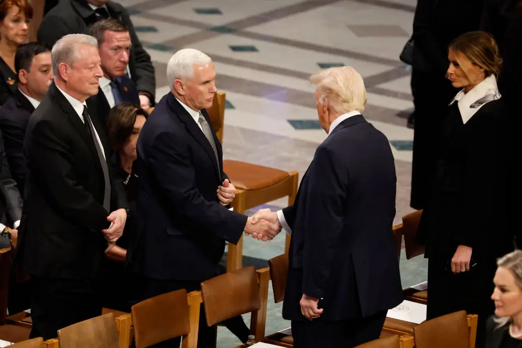 What Mike Pence said to Donald Trump as they met once again at Jimmy Carter's funeral