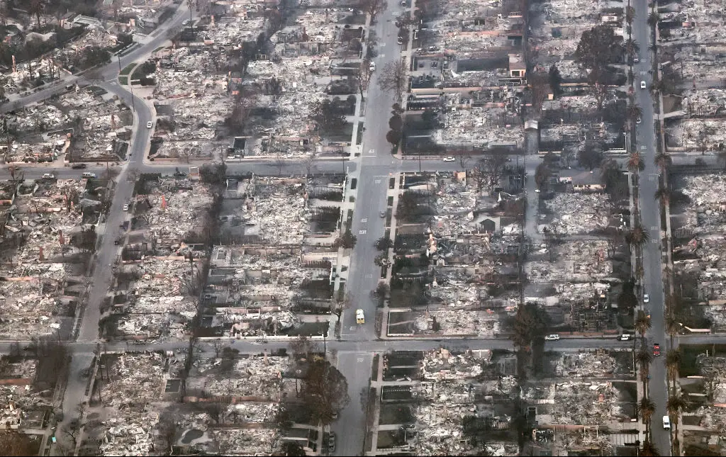 An aerial view of the destroyed homes after the Palisades Fire. Credit: Mario Tama / Getty