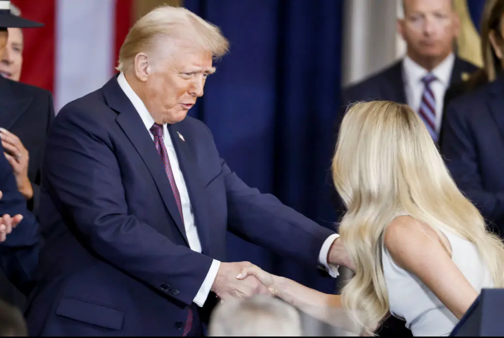 Trump shakes Underwood's hand. Credit: Shawn Thew-Pool/Getty Images