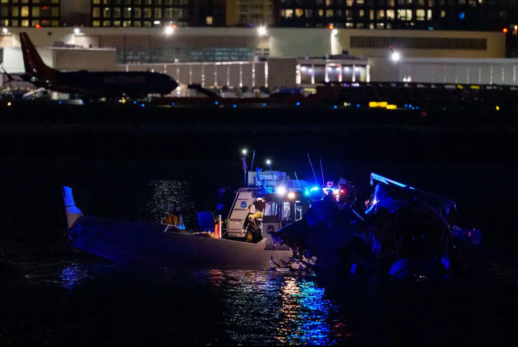 A man revealed that he received a text from his wife that she was landing soon before the collision. Credit:  Andrew Harnik / Getty