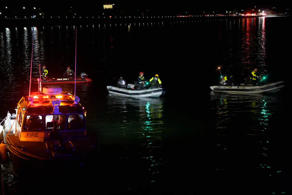 Around 300 responders are searching the river. Credit: Andrew Harnik / Getty