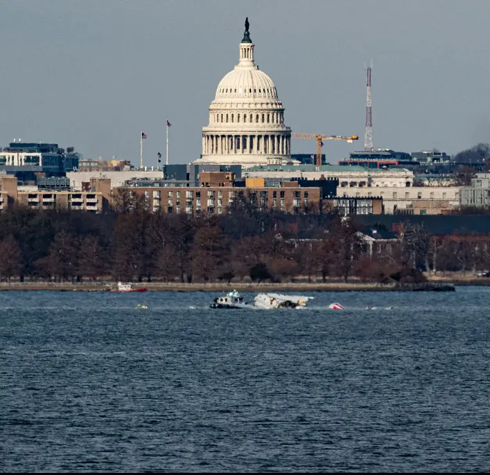 An American Airlines flight from Wichita, Kansas collided midair with a military Black Hawk helicopter.  Credit: Al Drago / Getty 