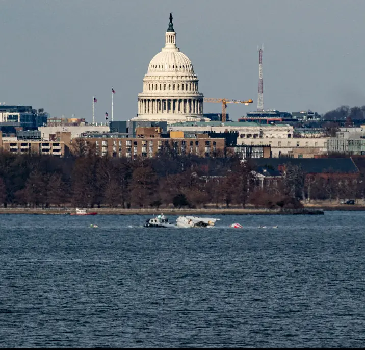 An American Airlines flight from Wichita, Kansas collided midair with a military Black Hawk helicopter.  Credit: Al Drago / Getty 