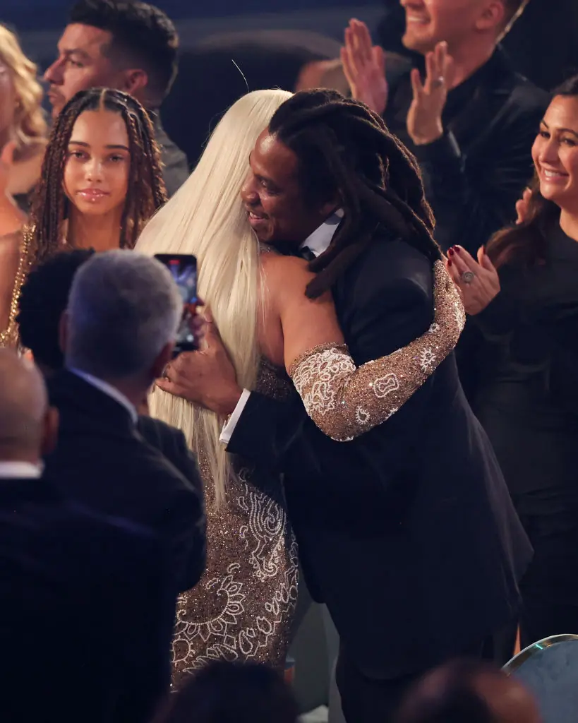 Beyonce shared a moment with Jay Z before accepting the award. Credit:	Christopher Polk / Getty