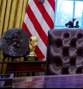 Can you spot the trophy? (Bottom left) Credit: Andrew Harnik/Getty Image