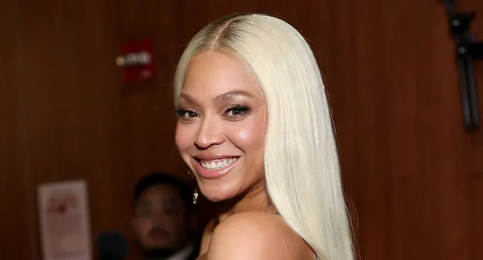 Viewers gush over 'full-circle moment' as Taylor Swift awards Beyoncé the Grammy for Country Album of the Year