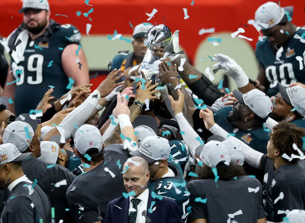 The Philadelphia Eagles celebrate with the Vince Lombardi Trophy. Credit:	Chris Graythen / Getty