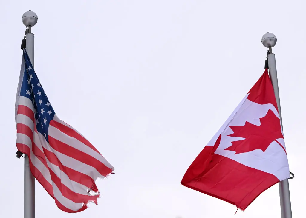 US and Canada flags. Credit: Artur Widak/NurPhoto via Getty Images