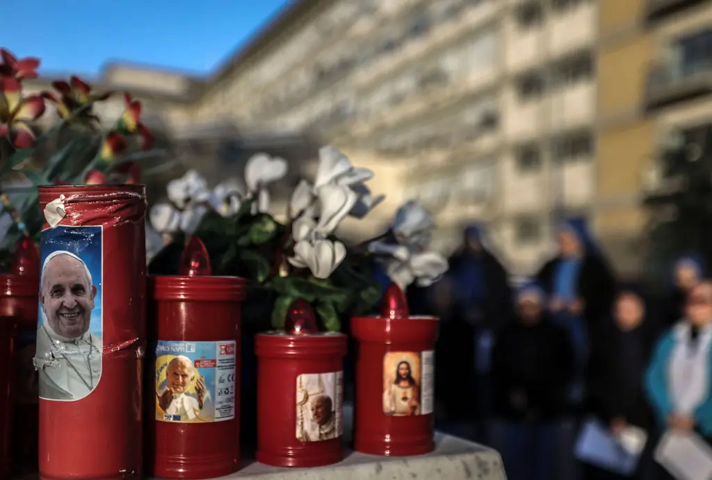  Church candles depicting Pope Francis seen outside the Gemelli Hospital. Credit: Alessandra Benedetti - Corbis/Corbis via Getty Images