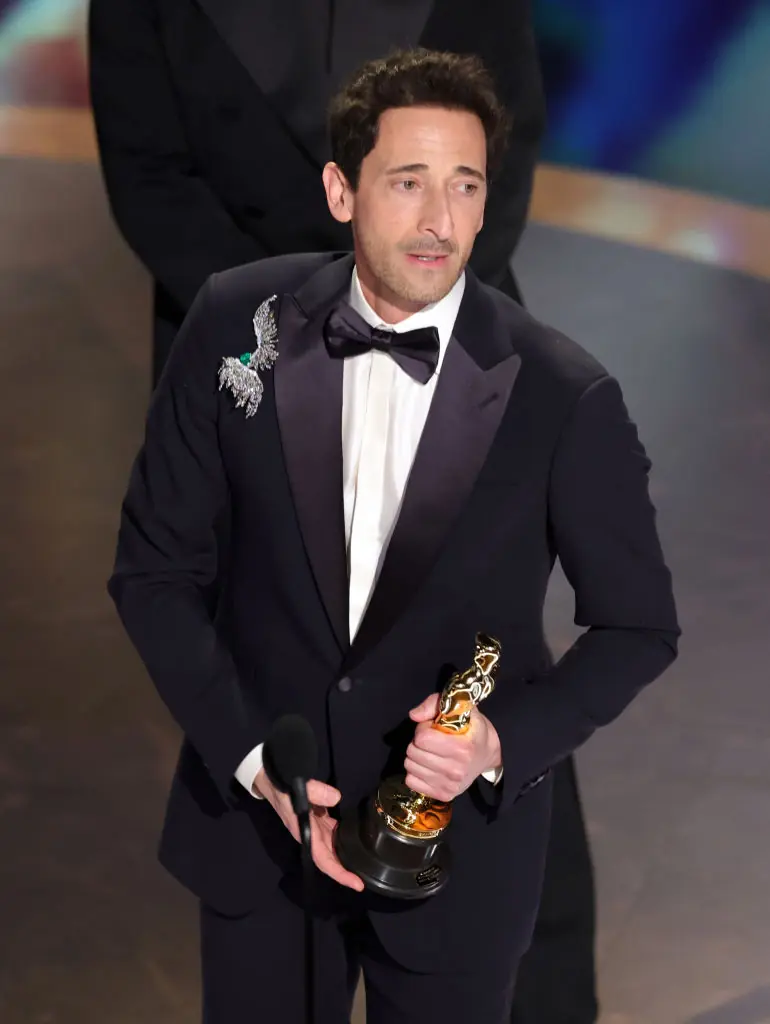 Adrien Brody accepts the Best Actor In A Leading Role award for "The Brutalist" Credit: Kevin Winter/Getty Images