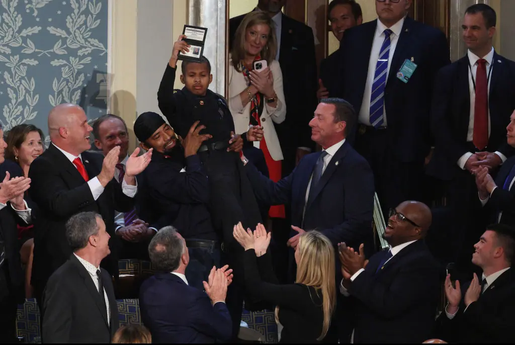 Donald Trump honoured 13-year-old cancer survivor Devarjaye "DJ" Daniel at Congress. Credit: Kayla Bartkowski / Getty