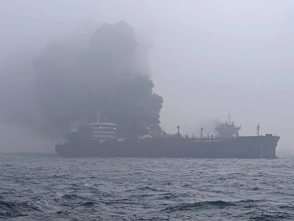 Flames and smoke rise from a collision between oil tanker and a cargo ship off the northeastern coast of England.Credit: Getty Images 