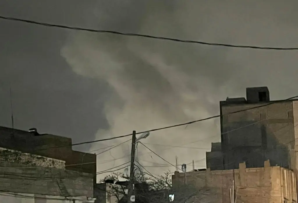 Smoke seen rising following the US airstrikes in the capital, Sanaa, Yemen. Credit: Mohammed Hamoud/Anadolu via Getty Images