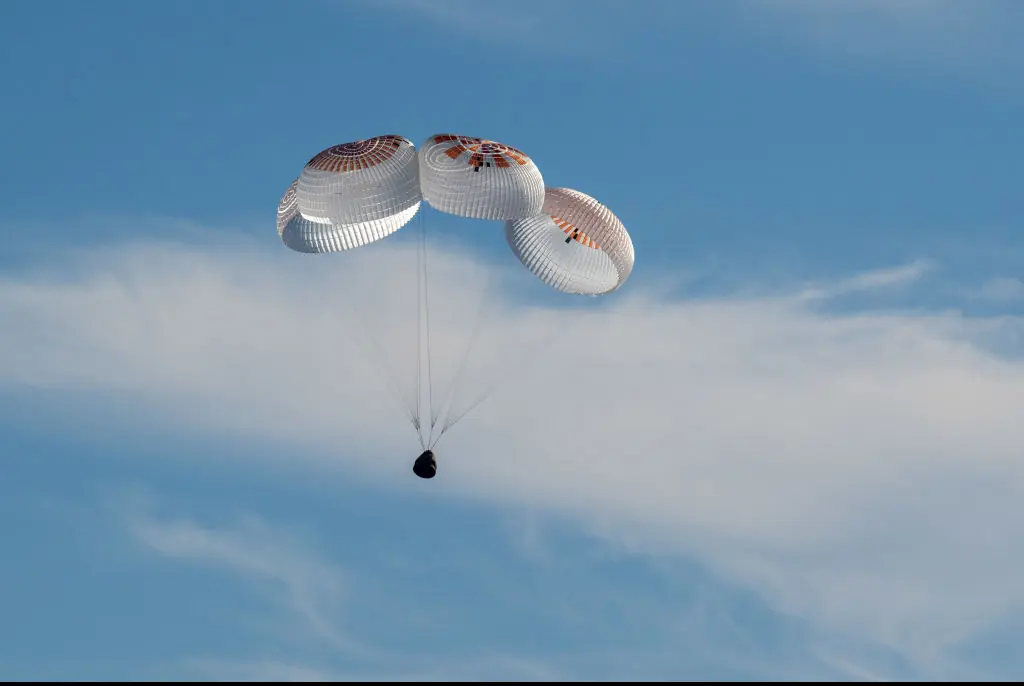 NASA astronauts are seen on Earth for first time in nine months after successful splash down