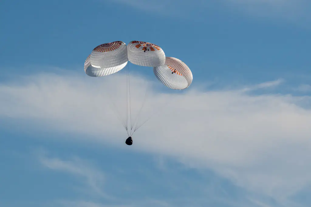 NASA astronauts are seen on Earth for first time in nine months after successful splash down