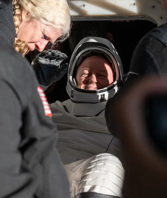 Butch Wilmore is helped out of the SpaceX Dragon spacecraft. Credit: NASA / Keegan Barber / Handout/Anadolu via Getty Images