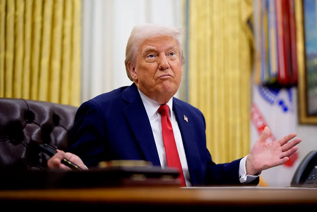 Elon Musk's Grok responds to a theory sparked by photo showing unusual detail in Donald Trump's trousers