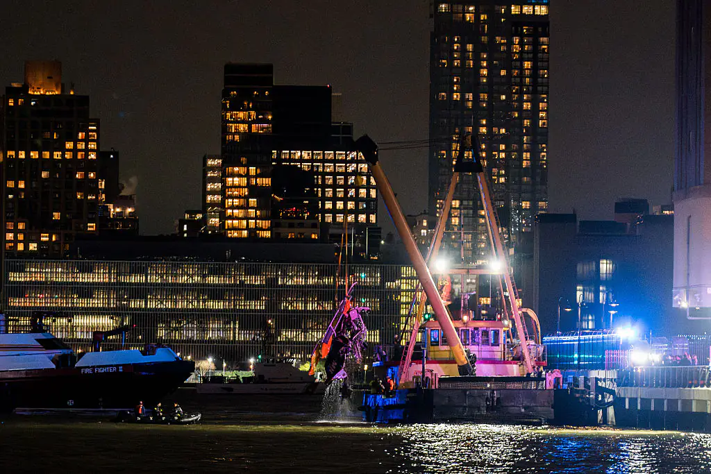 The wreckage was seen being lifted from the river. Credit: Thomas Hengge/Anadolu via Getty Images