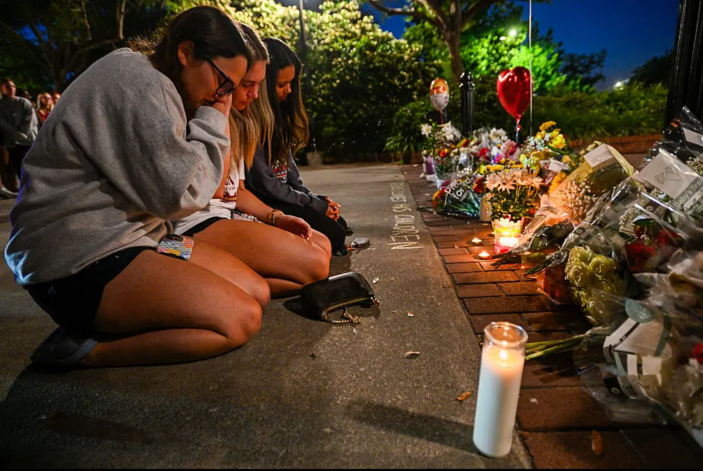 Students attend a vigil for those lost in the tragedy. Credit: Miguel J. Rodriguez Carrillo/Getty Images