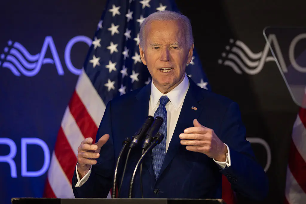 Online users are trying to figure out whether Joe Biden photoshopped himself into his family’s Easter picture. Credit: Scott Olson / Getty