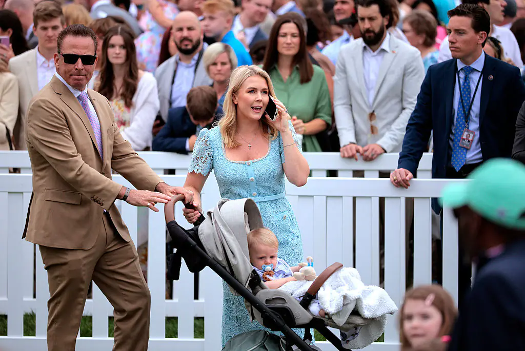 Leavitt with her son and husband Nicholas Riccio. Credit: Chip Somodevilla / Getty