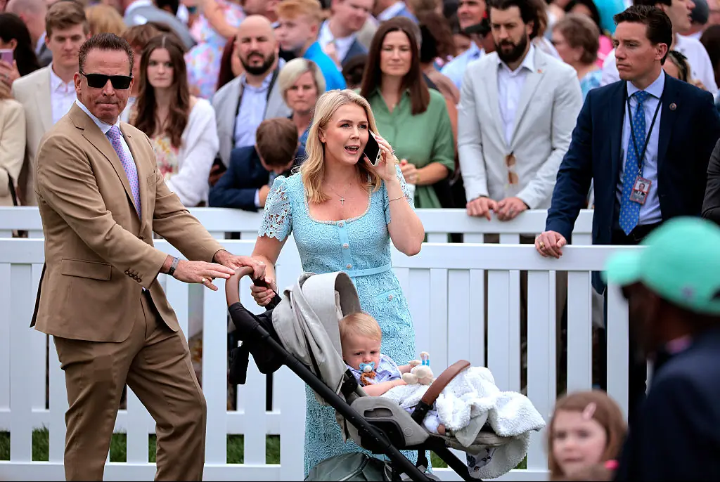 Leavitt with her son and husband Nicholas Riccio. Credit: Chip Somodevilla / Getty