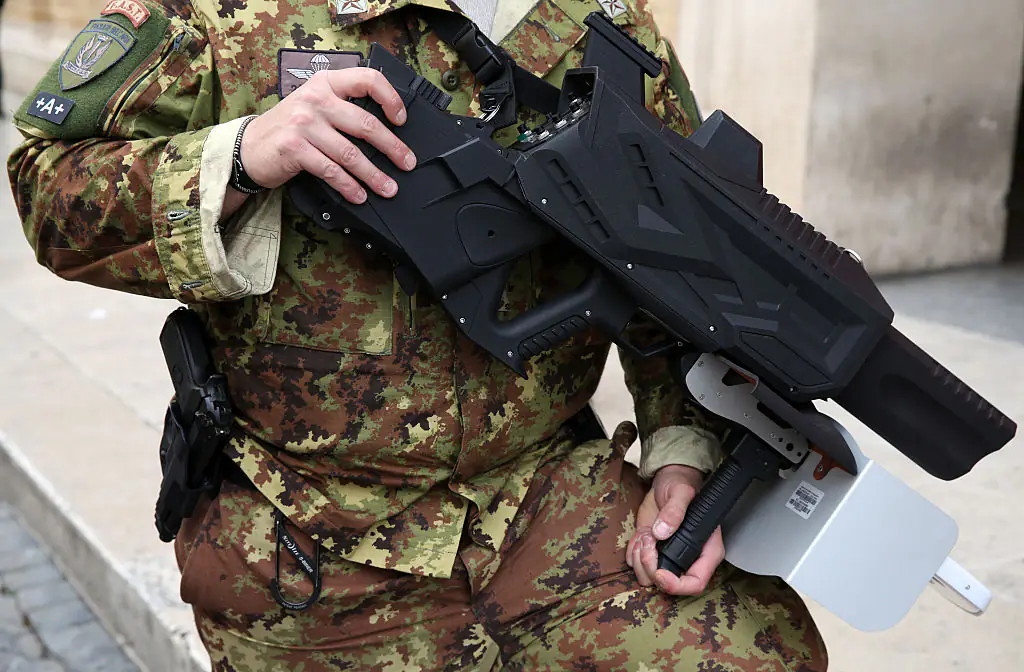 Another military officer holding an anti-drone gun. Credit: Adam Berry / Getty