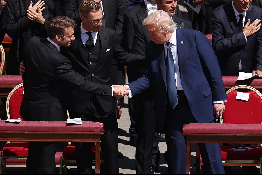 Trump's pointed warning to Macron at Pope's funeral revealed by lip reader