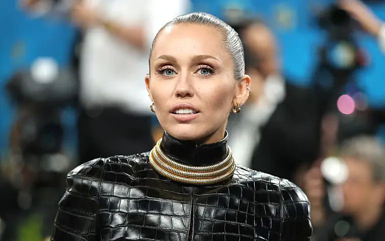 Miley Cyrus addresses feud with dad Billy Ray after the pair are pictured together for the first time in years