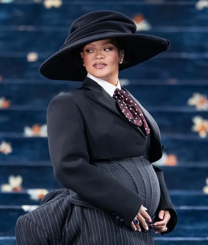 Rihanna dressed her bump in black tailoring. Credit:  Gilbert Carrasquillo/GC Images/Getty Images