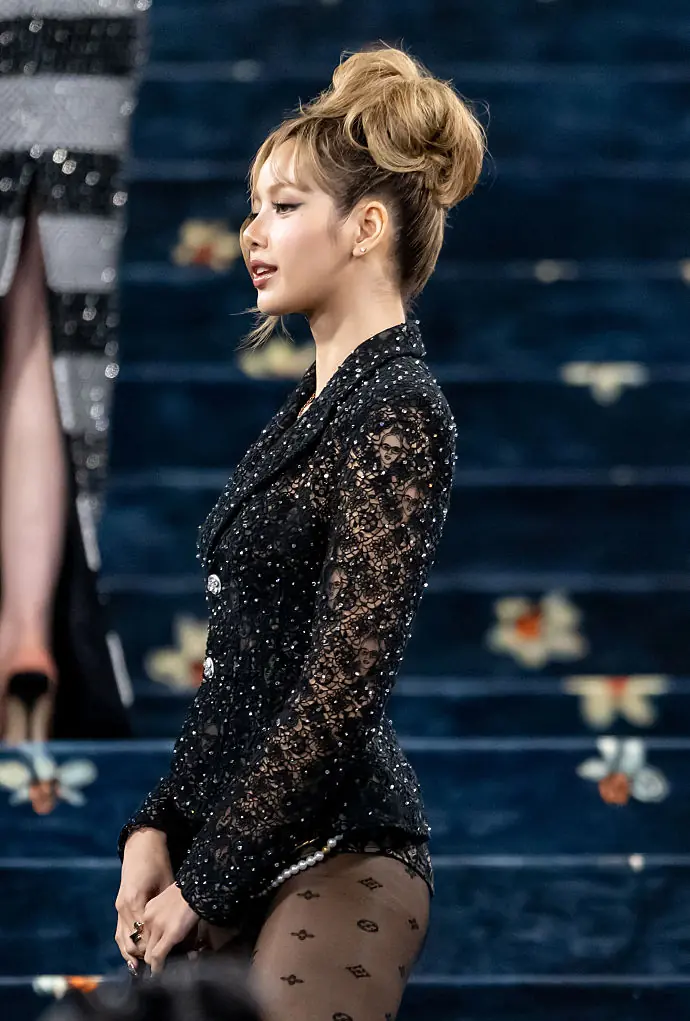 The outfit was embroidered by artist Henry Taylor for Louis Vuitton.  Credit: Gilbert Carrasquillo/GC Images