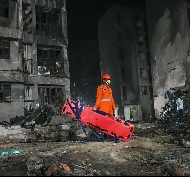 The plane crashed on a resident doctors' hostel in Ahmedabad, which suffered major damage in the accident.Credit: Hindustan Times / Getty