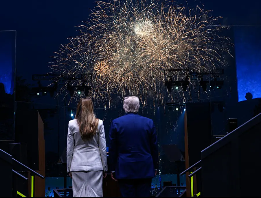 The POTUS and FLOTUS watch the celebrations unfold. Credit: Doug Mills - Pool/Getty Images