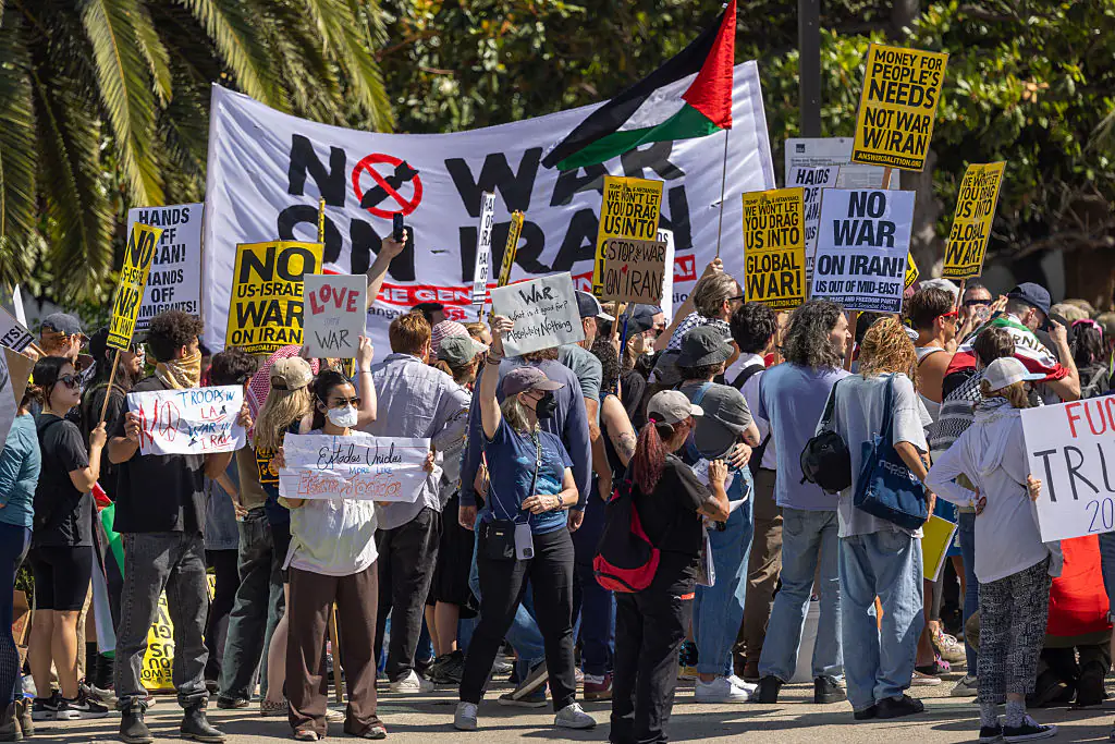 People protest the involvement of the U.S. in Israel's war against Iran. Credit: David McNew / Getty