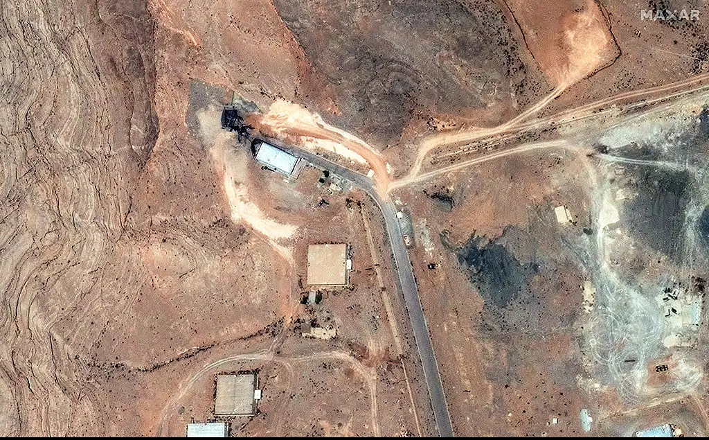 Maxar satellite imagery reveals new damage at the tunnel entrances of the Isfahan nuclear site following U.S. airstrikes. Credit: Maxar / Getty