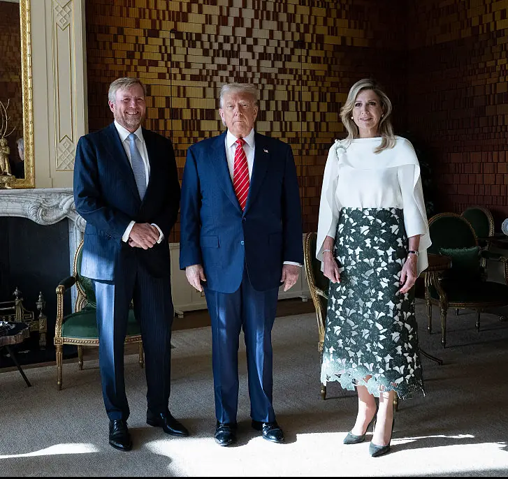 Trump's height didn't appear to be an issue the following day. Credit: Brendan Smialowski - Pool/Getty Images
