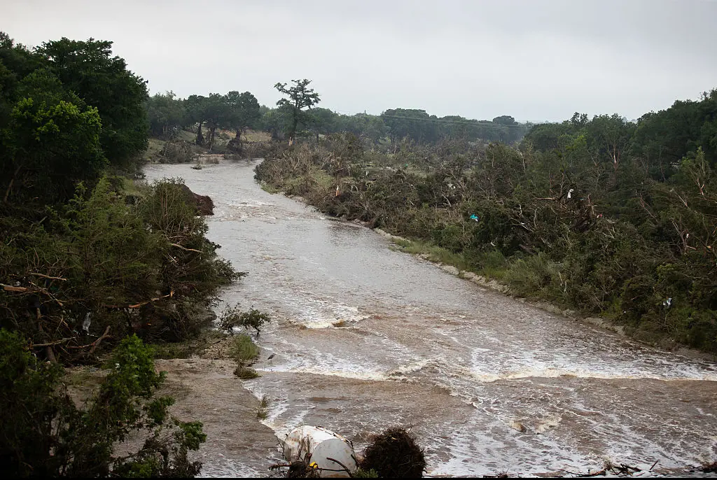 Guadalupe River flooded and surged by up to 30 feet above its usual water level on Friday. Credit: NurPhoto / Getty
