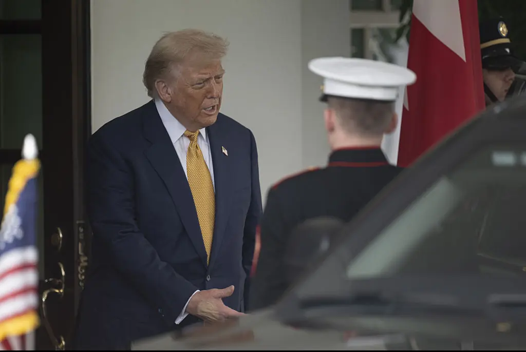 Trump's hands appears to be covered in make up as he greets Crown Prince and Prime Minister of the Kingdom of Bahrain Salman bin Hamad bin Isa Al Khalifa. Credit: Anadolu / Getty